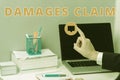Writing displaying text Damages Claim. Word Written on Demand Compensation Litigate Insurance File Suit Royalty Free Stock Photo