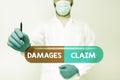 Sign displaying Damages Claim. Internet Concept Demand Compensation Litigate Insurance File Suit Scientist Demonstrating Royalty Free Stock Photo