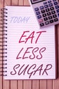 Text caption presenting Eat Less Sugar. Concept meaning reducing sugar intake and eating a healthful diet rich foods Royalty Free Stock Photo