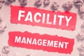 Hand writing sign Facility Management. Conceptual photo Understanding Monetary areas like Finance and Investing Tear On Royalty Free Stock Photo