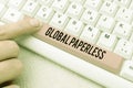 Text caption presenting Global Paperless. Word Written on going for technology methods like email instead of paper Royalty Free Stock Photo