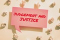 Handwriting text Judgement And Justice. Business approach system of laws in a country that judges showing