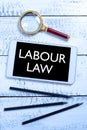 Text caption presenting Labour Law. Word for Rules implemented by the state between employers and employee Tablet Screen