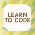 Hand writing sign Learn To Code. Business showcase Learn to write Software Be a Computer Programmer Coder Royalty Free Stock Photo