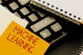 Text caption presenting Machine Learning. Word Written on the concept that a computer can learn new data itself Typing Royalty Free Stock Photo