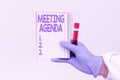 Text caption presenting Meeting Agenda. Word Written on items that participants hope to accomplish at a meeting Studying Royalty Free Stock Photo