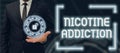 Text showing inspiration Nicotine Addiction. Business concept condition of being addicted to smoking or tobacco Royalty Free Stock Photo