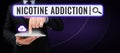 Text caption presenting Nicotine Addiction. Internet Concept condition of being addicted to smoking or tobacco consuming Royalty Free Stock Photo