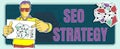 Text caption presenting Seo Strategy. Business concept Techniques and tactics to increase the visitors of a website Man