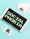 Hand writing sign Social Phobia. Concept meaning overwhelming fear of social situations that are distressing Royalty Free Stock Photo