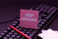 Text caption presenting Stop Depression. Concept meaning end the feelings of severe despondency and dejection Typing