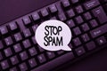 Text caption presenting Stop Spam. Word Written on end the Intrusive or Inappropriate messages sent on the Internet