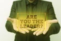 Text caption presenting Are You The Leader Question. Business overview asking for the qualification of being a good boss