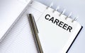 Text CAREER on the short note texture background with pen Royalty Free Stock Photo