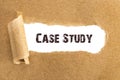 The text Case Study appearing behind torn brown paper Royalty Free Stock Photo