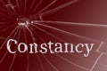 The text Constancy on the broken glass Royalty Free Stock Photo
