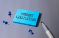 text Current Liabilities on white paper.