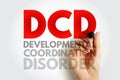 Text DCD Developmental Coordination Disorder written with marker by hand. Medical abbreviation describing motor skill disorder Royalty Free Stock Photo