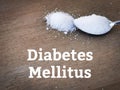 text DIABETES MELLITUS and a spoon of sugar.Medical concept.