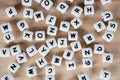 Text dice cube concept / Letter dices alphabet on wooden background. Block of alphabet studded on the floor