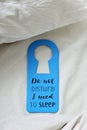 Text do not disturb I need to sleep in a door hanger