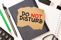 text do not disturb on short note paper on the packing paper box texture background