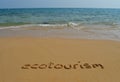 Text ecotourism in the sand Royalty Free Stock Photo