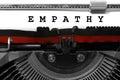 Text Empathy written on white shhet with the vintage typewriter