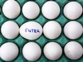 Text Enter on a white egg