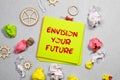 Text Envision Your Future on notepad as business concept image Royalty Free Stock Photo