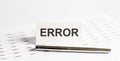 Text ERROR on stickers,pen on the background of documents. Financial bookkeeping, Accounting Concept