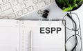 Text ESPP Employee Stock Purchase Plan on calendar planner to remind you an important appointment with a pen on isolated white