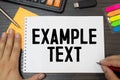 text EXAMPLE text on the short note texture background with pen Royalty Free Stock Photo
