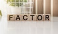 text factor written on wooden cubes. risk factors. evaluation of sales factors. High quality photo