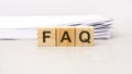 text FAQ - Frequency Asked Questions made with wood building blocks, stock image Royalty Free Stock Photo