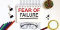 Text fear of failure inscription text on the white notepad on office table Royalty Free Stock Photo
