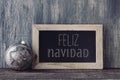 Text feliz navidad, merry christmas in spanish Royalty Free Stock Photo