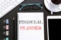 Text Financial planner on white paper background / business concept