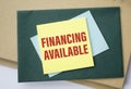Text financing available on the short note texture Royalty Free Stock Photo