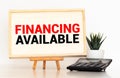 Text financing available on the short note texture background Royalty Free Stock Photo