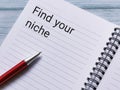 Text find your niche written on note book with a pen. Royalty Free Stock Photo