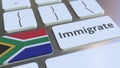 IMMIGRATE text and flag of South Africa on the buttons on the computer keyboard. Conceptual 3D rendering