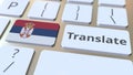 TRANSLATE text and flag of Serbia on the buttons on the computer keyboard. Conceptual 3D rendering Royalty Free Stock Photo