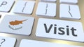 VISIT text and flag of Cyprus on the buttons on the computer keyboard. Conceptual 3D rendering