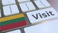VISIT text and flag of Lithuania on the buttons on the computer keyboard. Conceptual 3D rendering