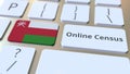 Online Census text and flag of Oman on the keyboard. Conceptual 3D rendering