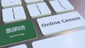 Online Census text and flag of Saudi Arabia on the keyboard. Conceptual 3D rendering