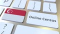 Online Census text and flag of Singapore on the keyboard. Conceptual 3D rendering