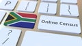 Online Census text and flag of South Africa on the keyboard. Conceptual 3D rendering