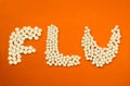 The word `Flu` made by Medicine pills. Flu Season Ahead Royalty Free Stock Photo